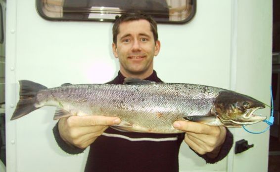 Club Chairman Seamus Donnelly displays his fish with FCB tag attached.